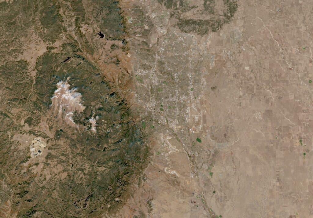 A satellite mosaic of Colorado Springs, Colorado. The entire landscape is visible without clouds.