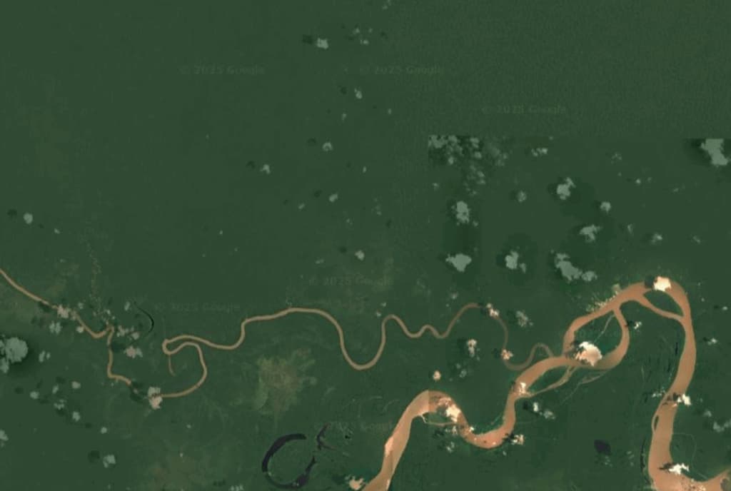Google maps screenshot of the Amazon rainforest showing some cloud cover.